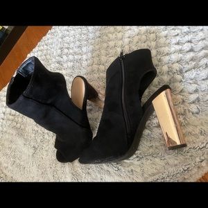 Black booties with rose gold heels